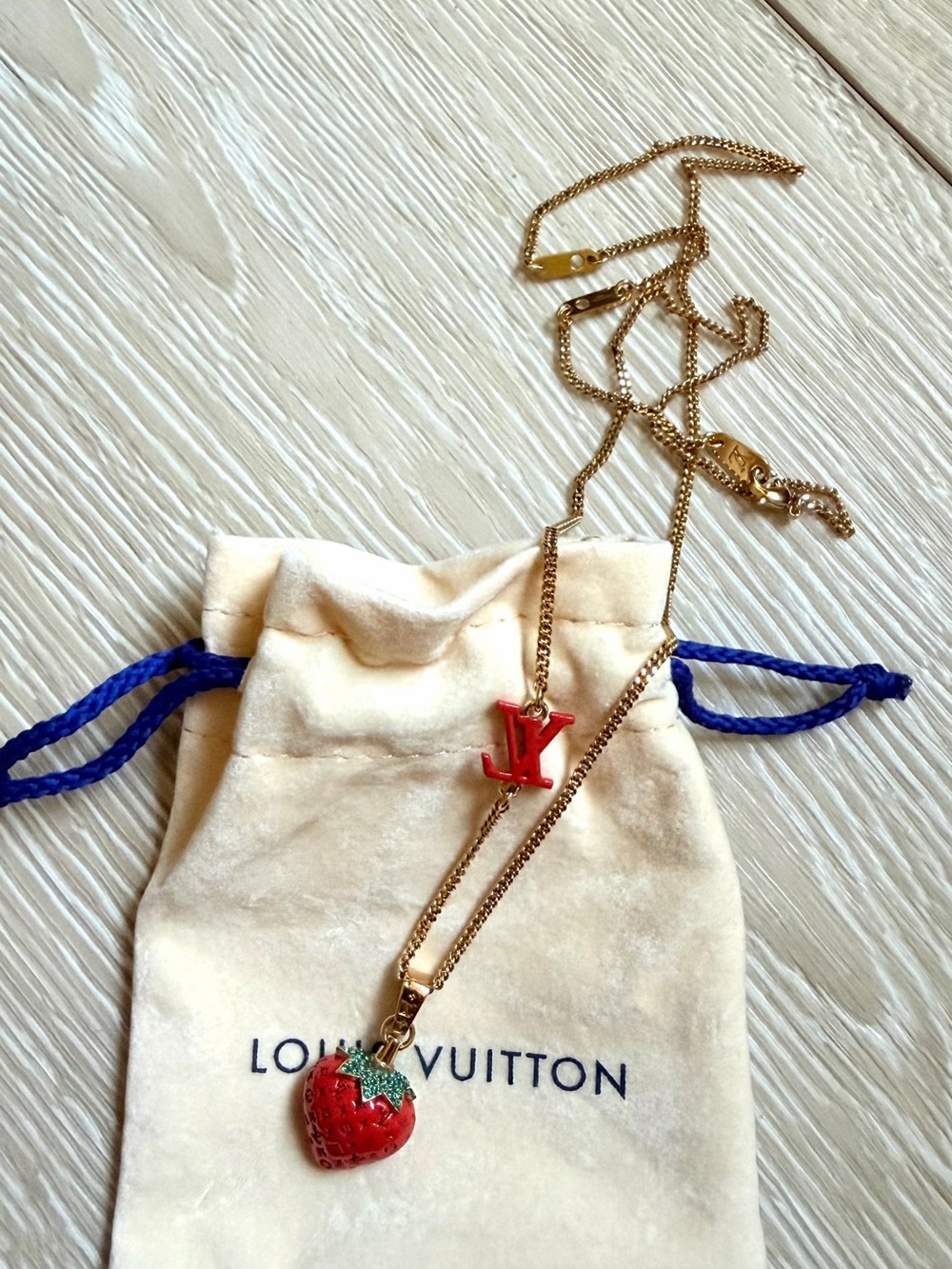Louis Vuitton Gold-Tone Necklace with Red Strawberry and Red LV Pendant